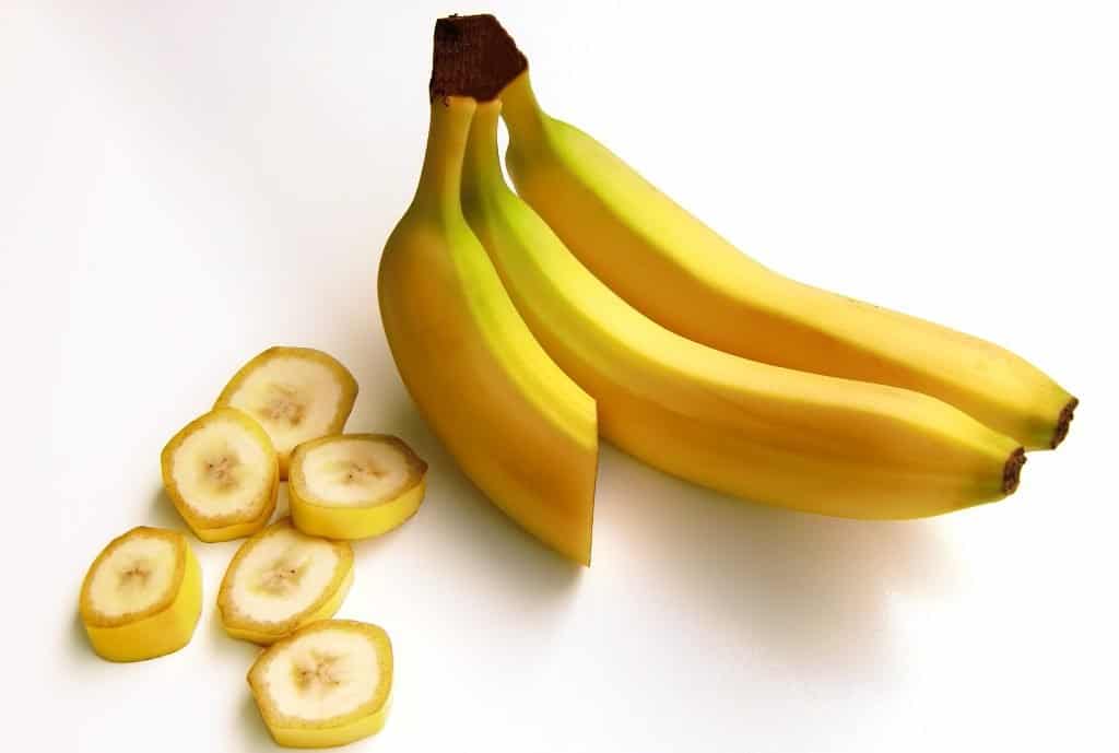 Can Charming Pugs Eat Bananas? 2 3 Yellow Banana Fruits on white background