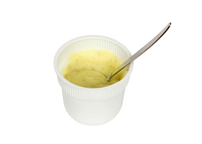 instant mashed potatoes in a cup with spoon