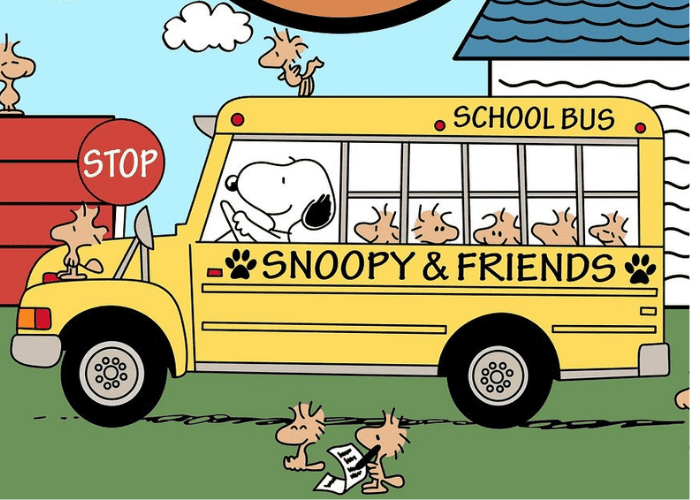 snoopy driving a bus